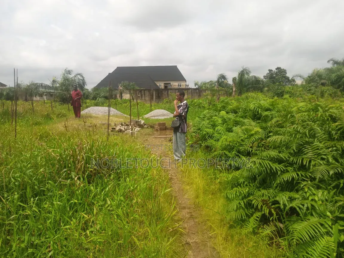 Commercial Half Plot of Land a Uncompleted Building