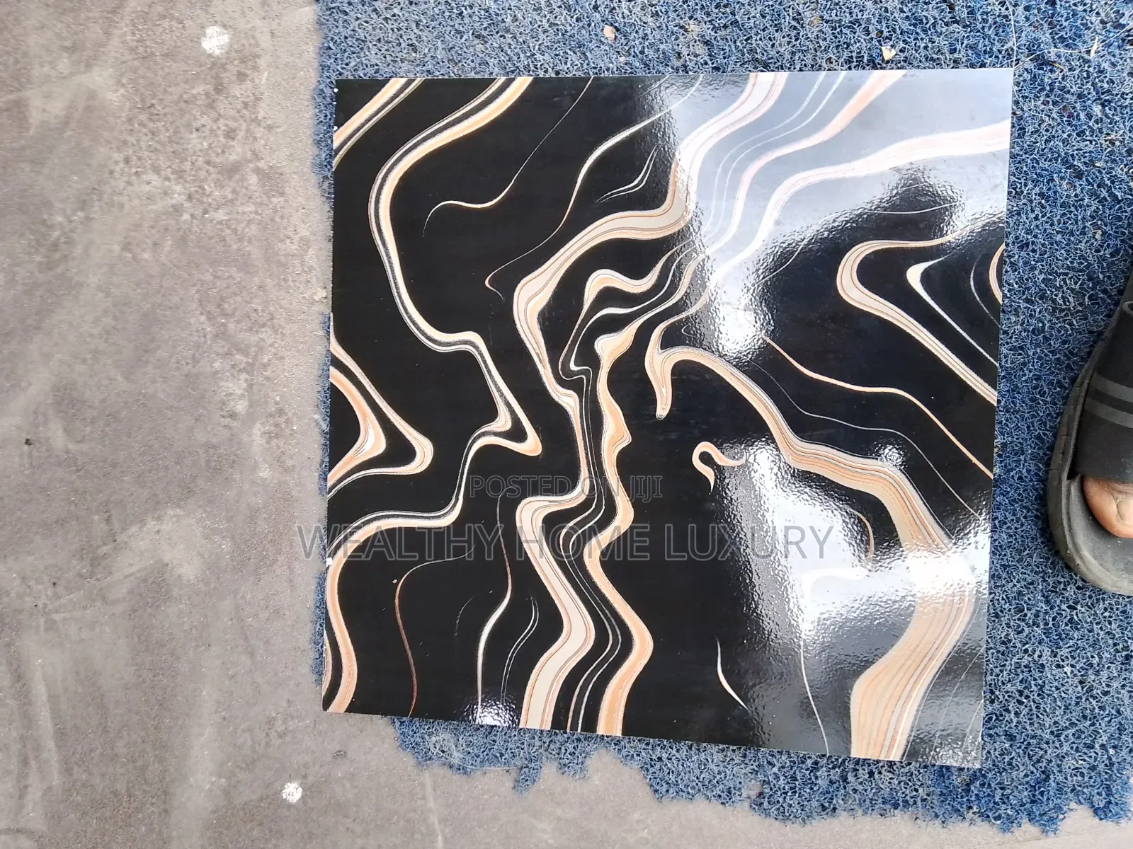 Polished Black-and-Gold Abstract Liquid Marble Floor Tile.