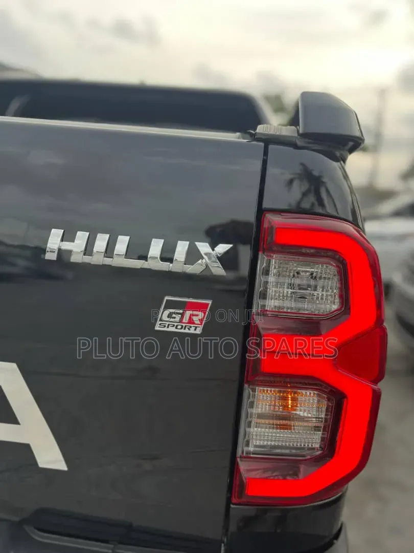 Electric Roller Boot Cover & TRD Spoiler Hilux