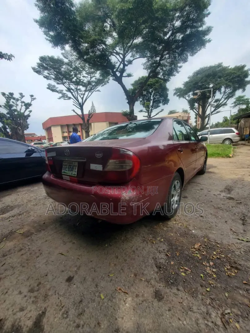 Toyota Camry LE 4dr Sedan (2.4L 4cyl 5M) 2003 Red