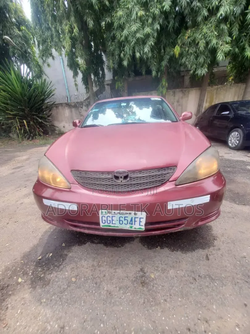 Toyota Camry LE 4dr Sedan (2.4L 4cyl 5M) 2003 Red