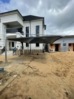 Carport With Black Net Shade