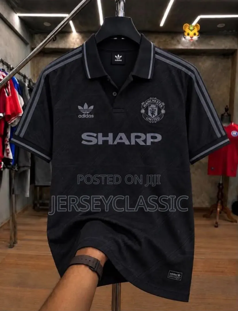 Manchester United Retro Black Polo Jersey – Adidas Classic Design