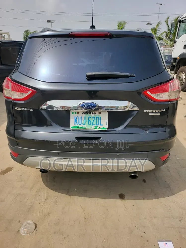 Ford Escape Titanium 4dr SUV (1.6L 4cyl Turbo 6A) 2014 Black