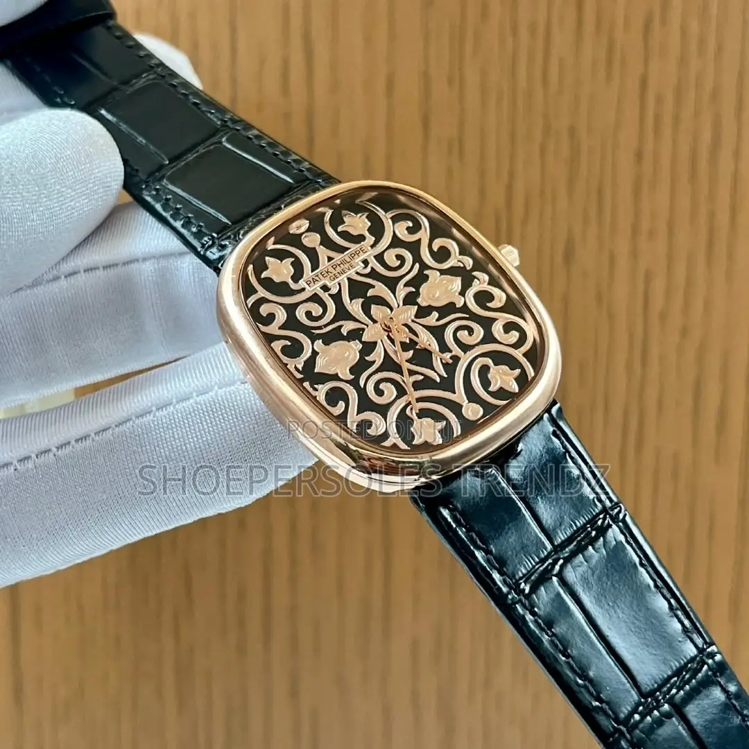 Patek Philippe Rose Gold Tonneau Watch | Floral Elegance