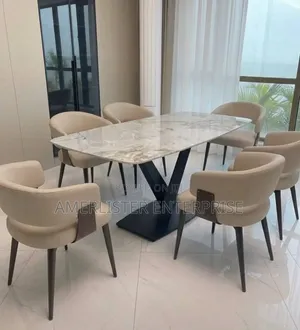Unique Table and 6 Chairs.