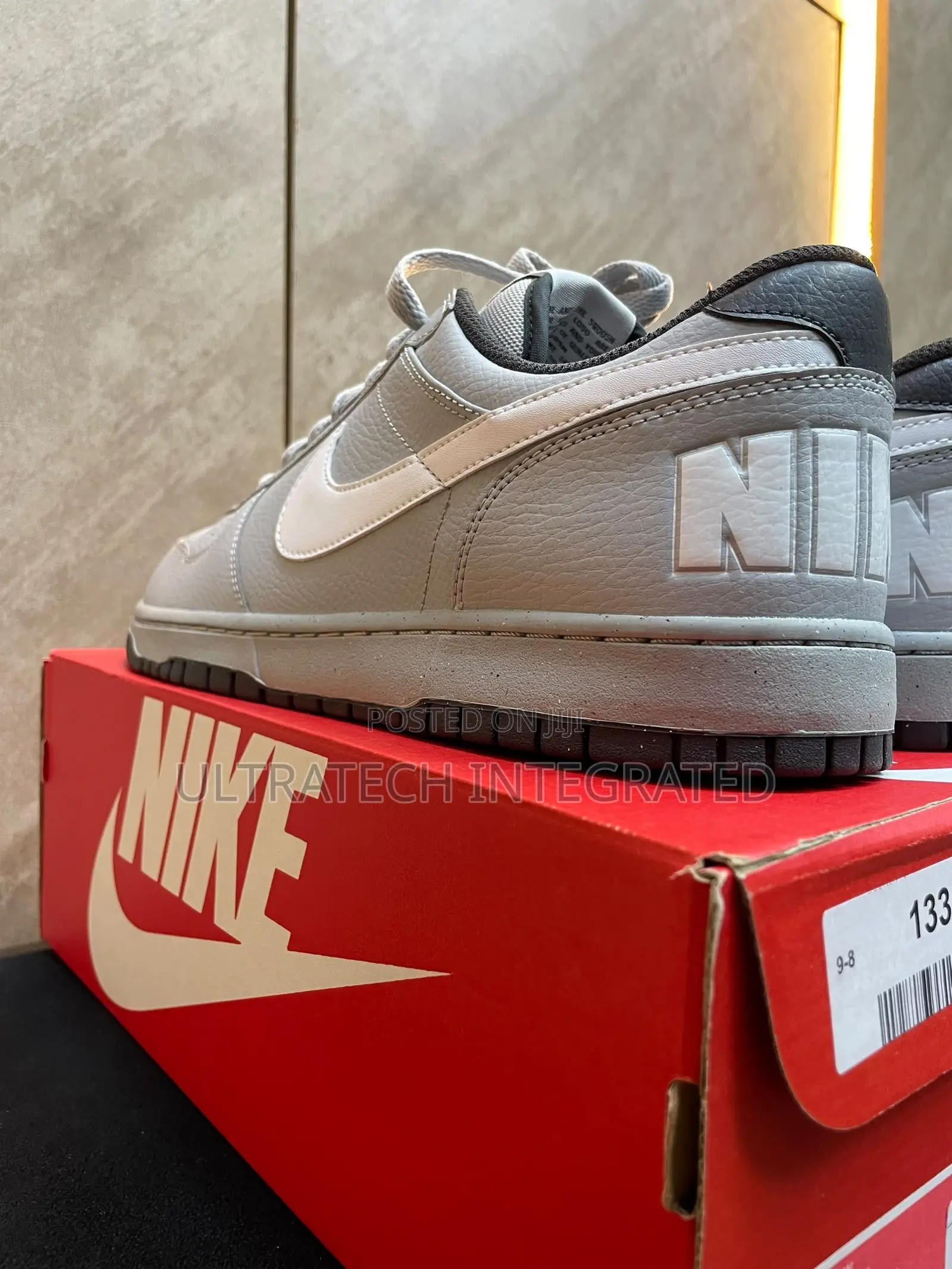 Nike Men’s Dunk Low Embossed Big Logo Sneaker