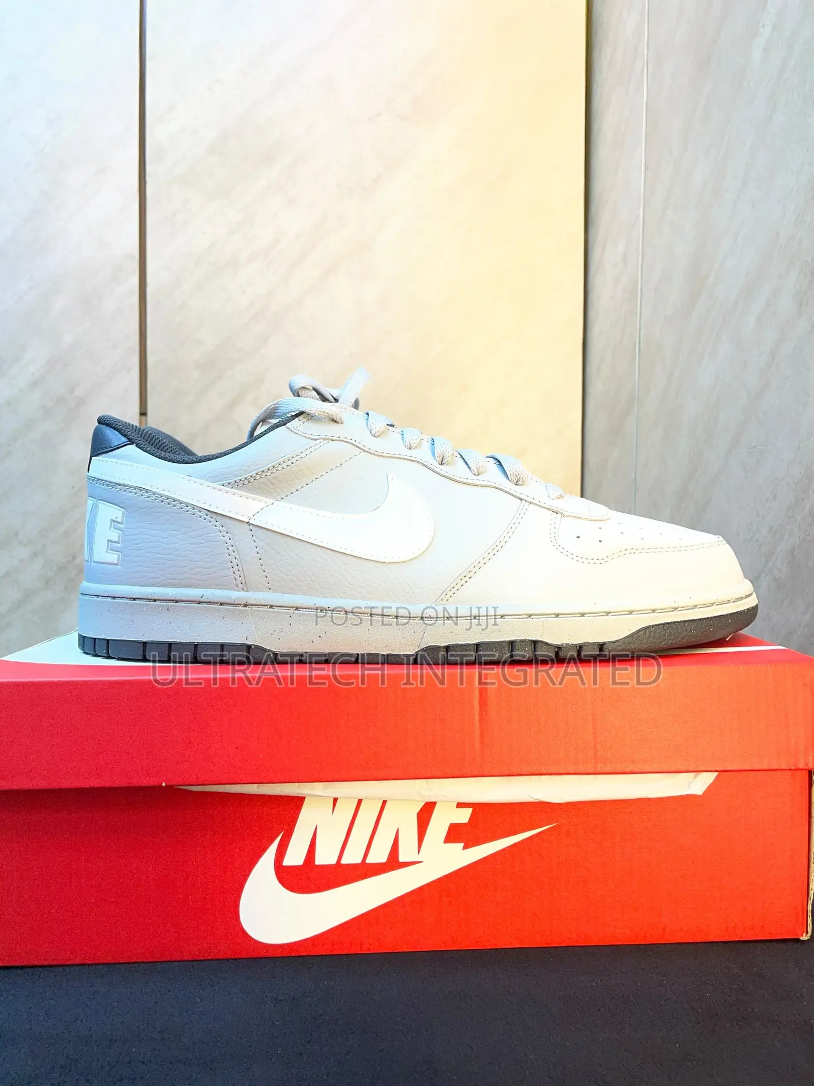Nike Men’s Dunk Low Embossed Big Logo Sneaker