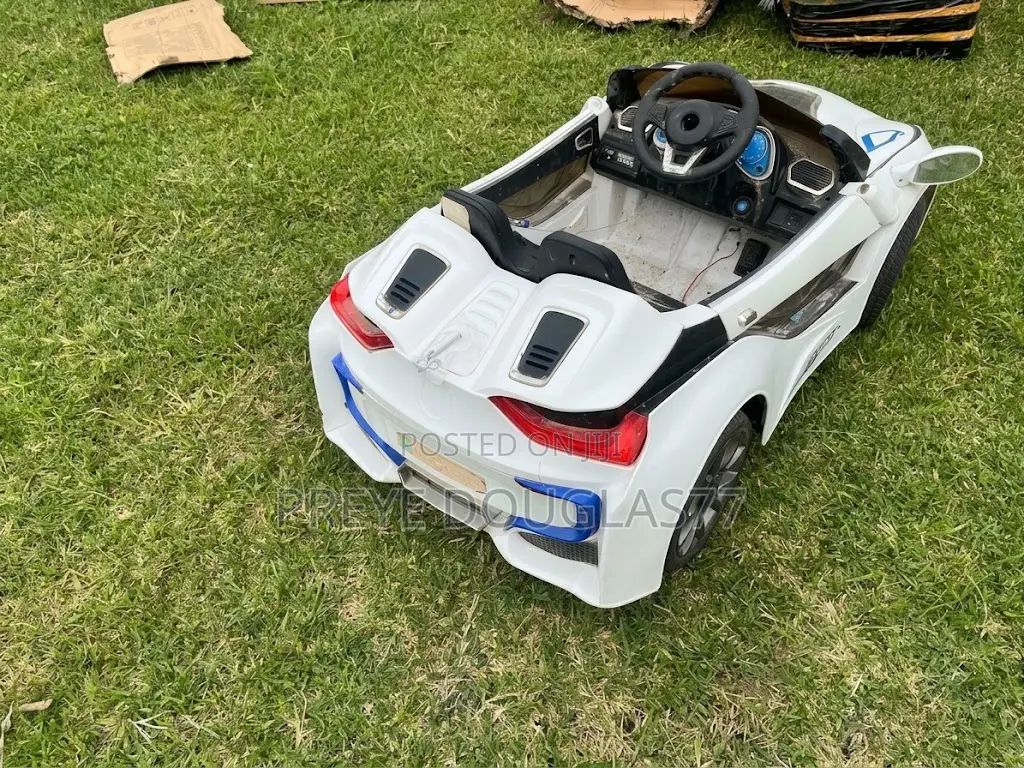 Used Kids Electric Ride-on Sports Car (BMW I8 Style - AS IS)