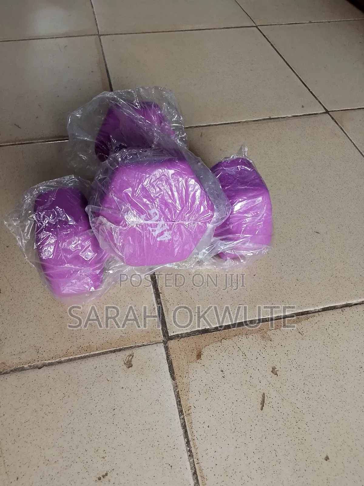 A Pair of 4kg Purple Hex Dumbbells