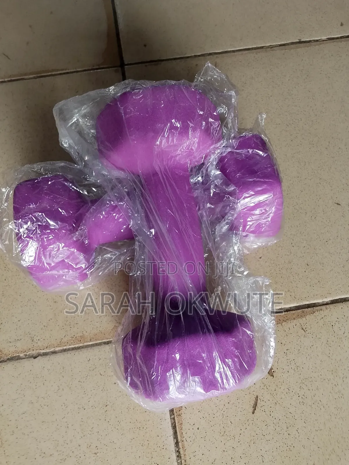 A Pair of 4kg Purple Hex Dumbbells