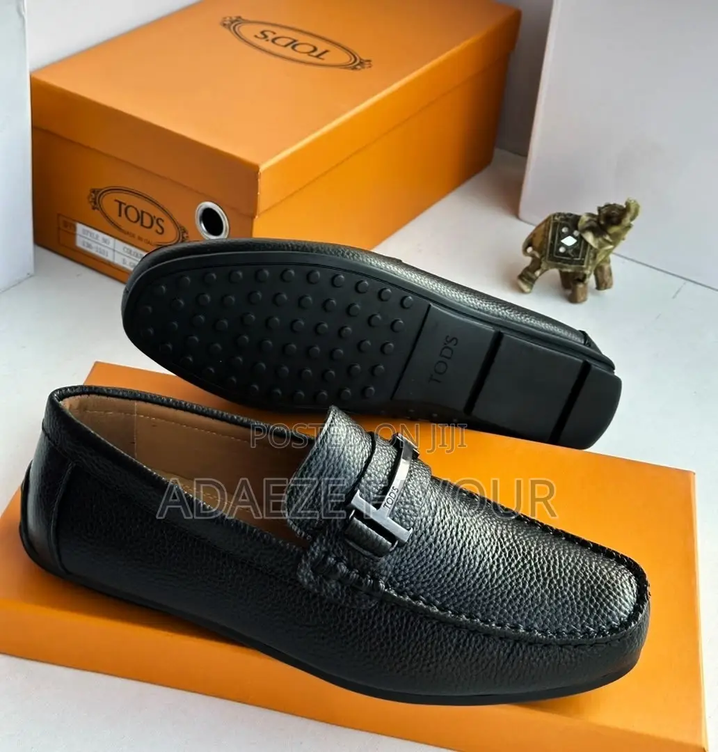 Men’s Grey Suede Tod’s Driving Loafers With Metal Logo Detail