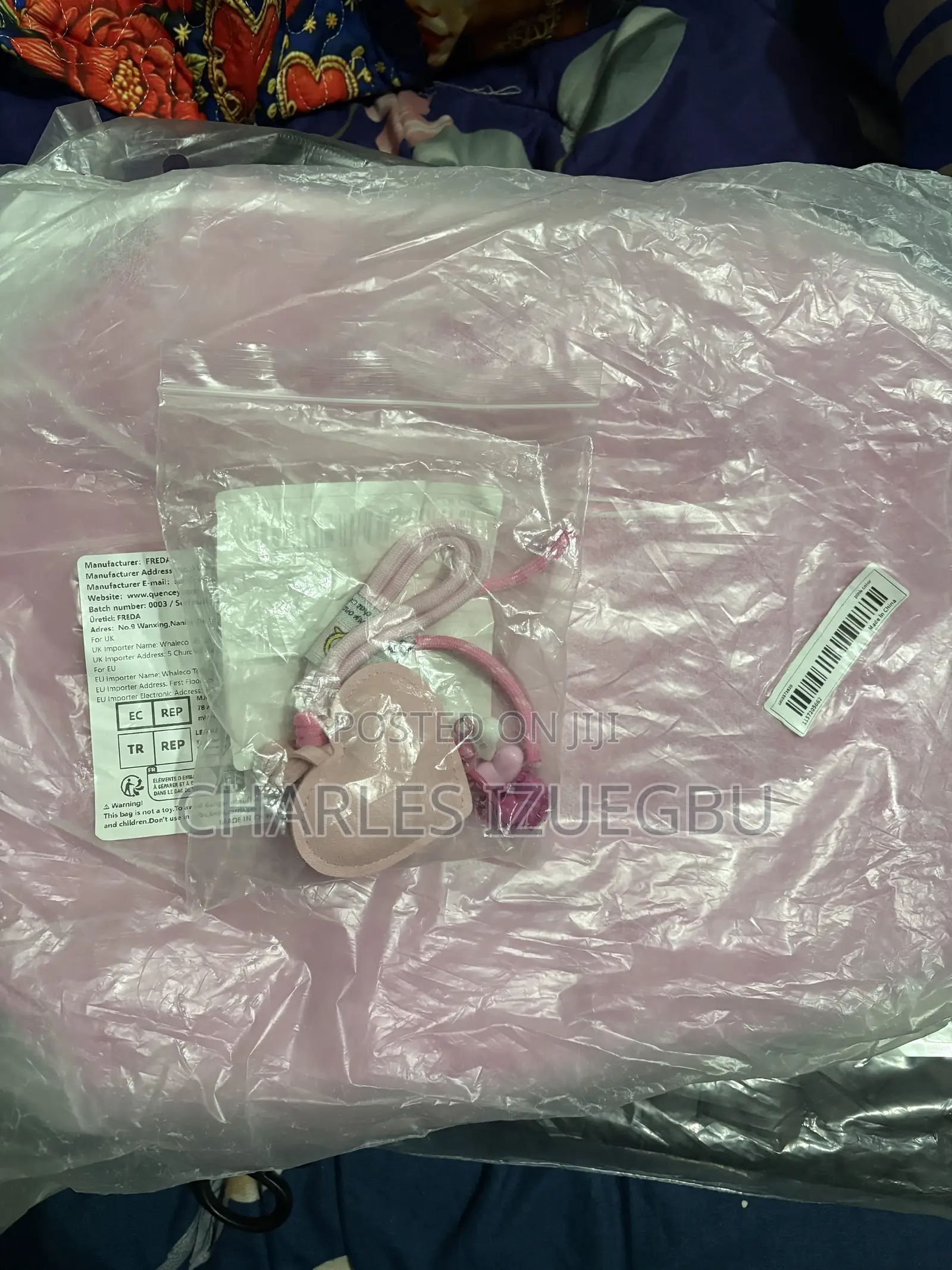 2 Duffle Bags Black and Pink With Attachable Charms