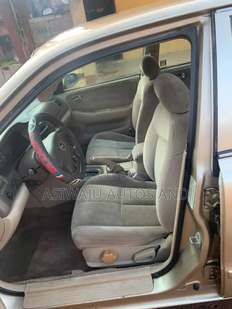 Mazda 626 LX 4dr Sedan (2.0L 4cyl 5M) 2002 Gold