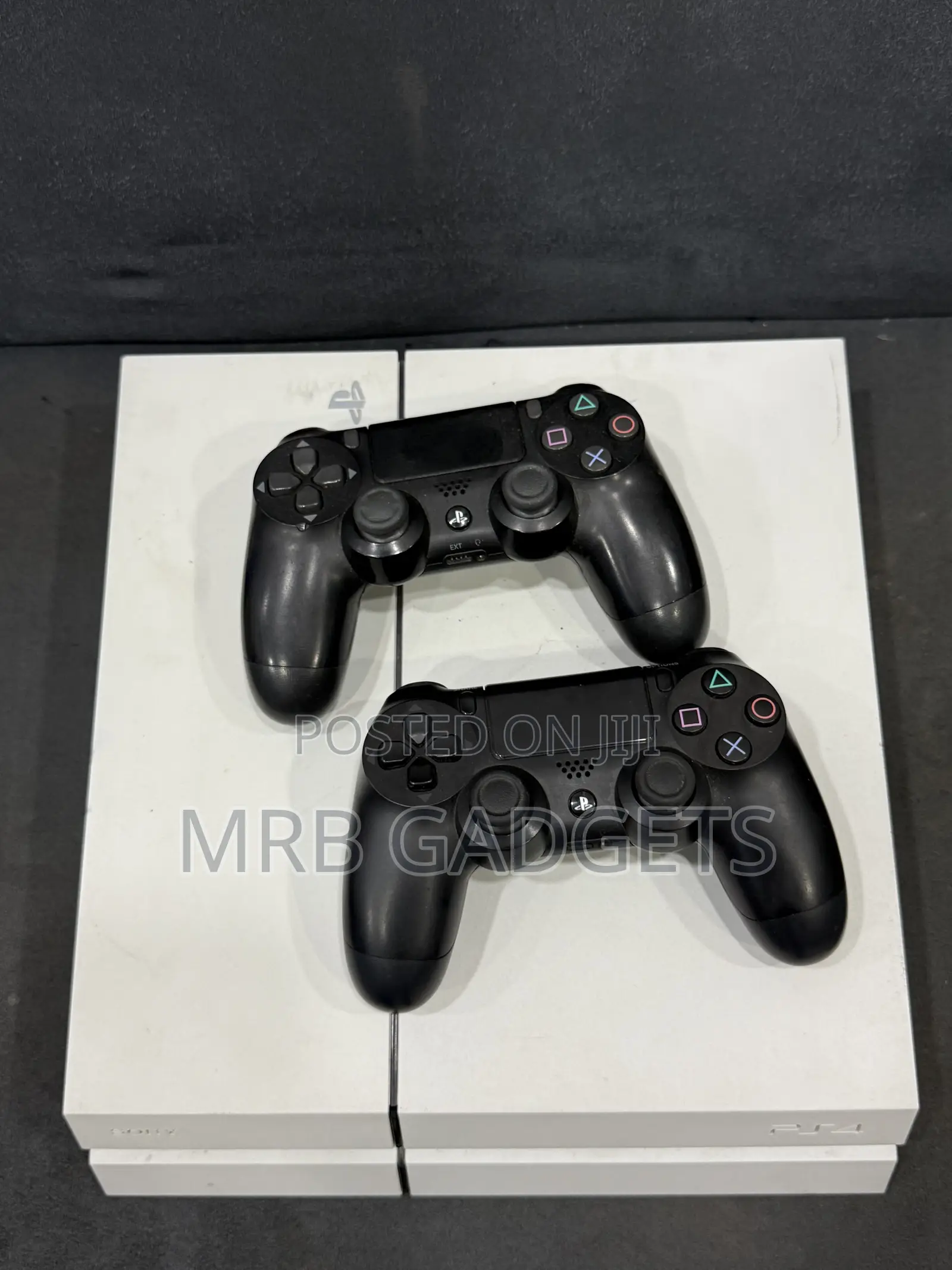 Uk Used Ps4 Fat With Two Pads and 10 Games