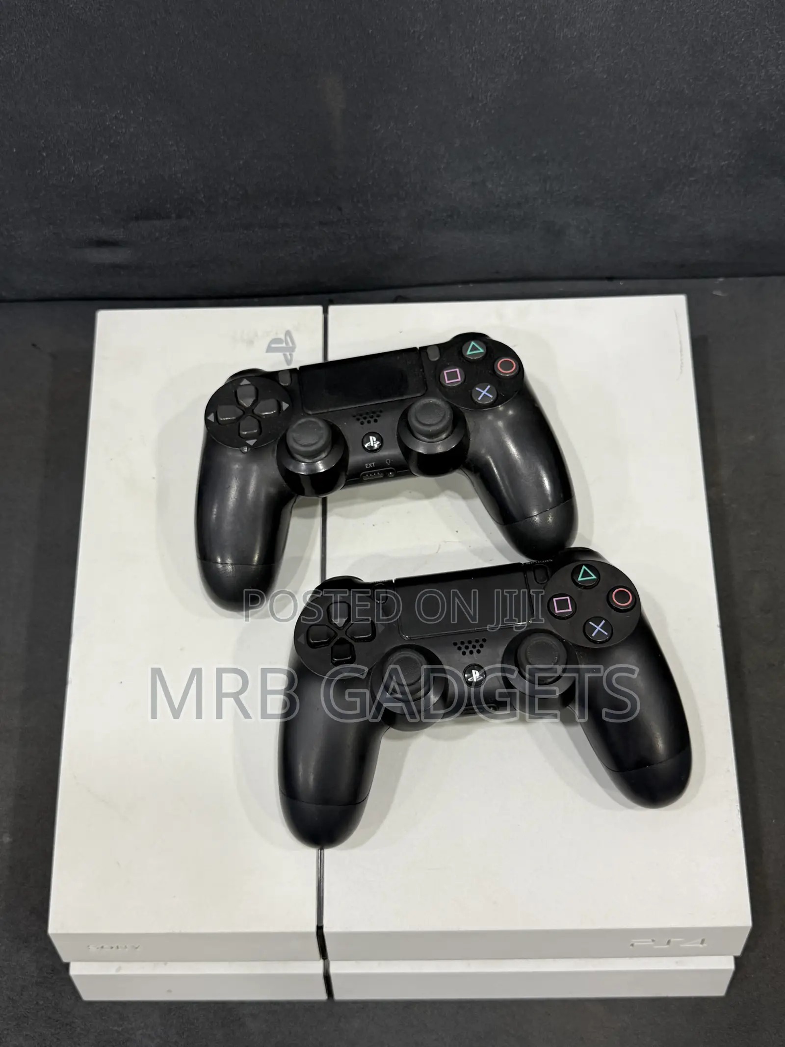 Uk Used Ps4 Fat With Two Pads and 10 Games