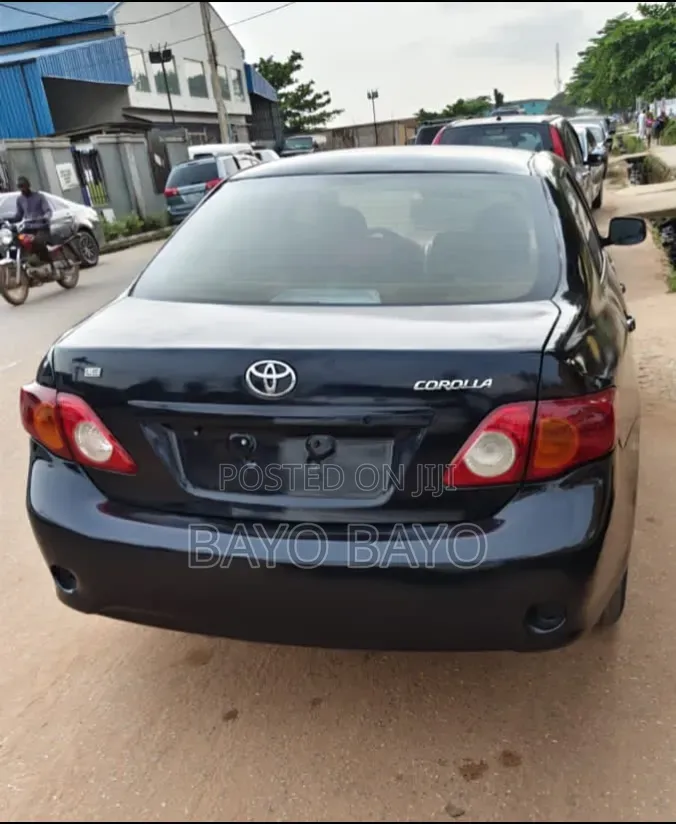 Toyota Corolla Base 4dr Sedan (1.8L 4cyl 5M) 2009 Black