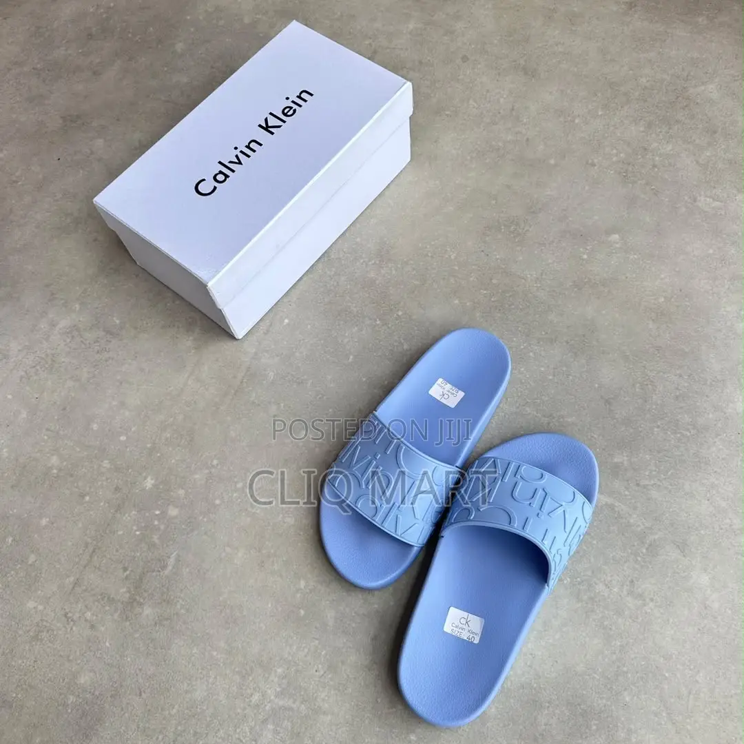 Calvin Klein Embossed Monogram Slider Sandals