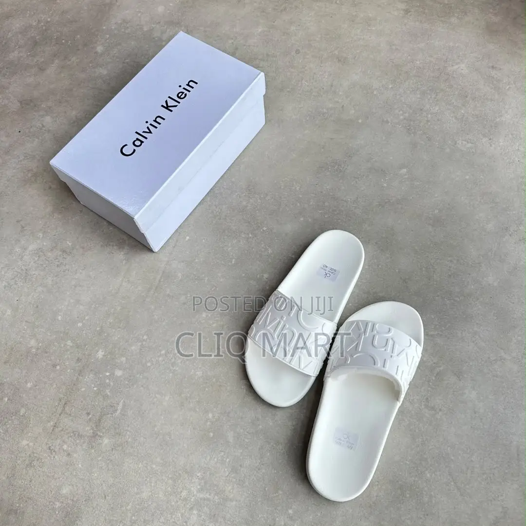 Calvin Klein Embossed Monogram Slider Sandals