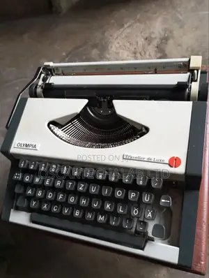 Olympia Portable Manual Typewriter (Inside Box)