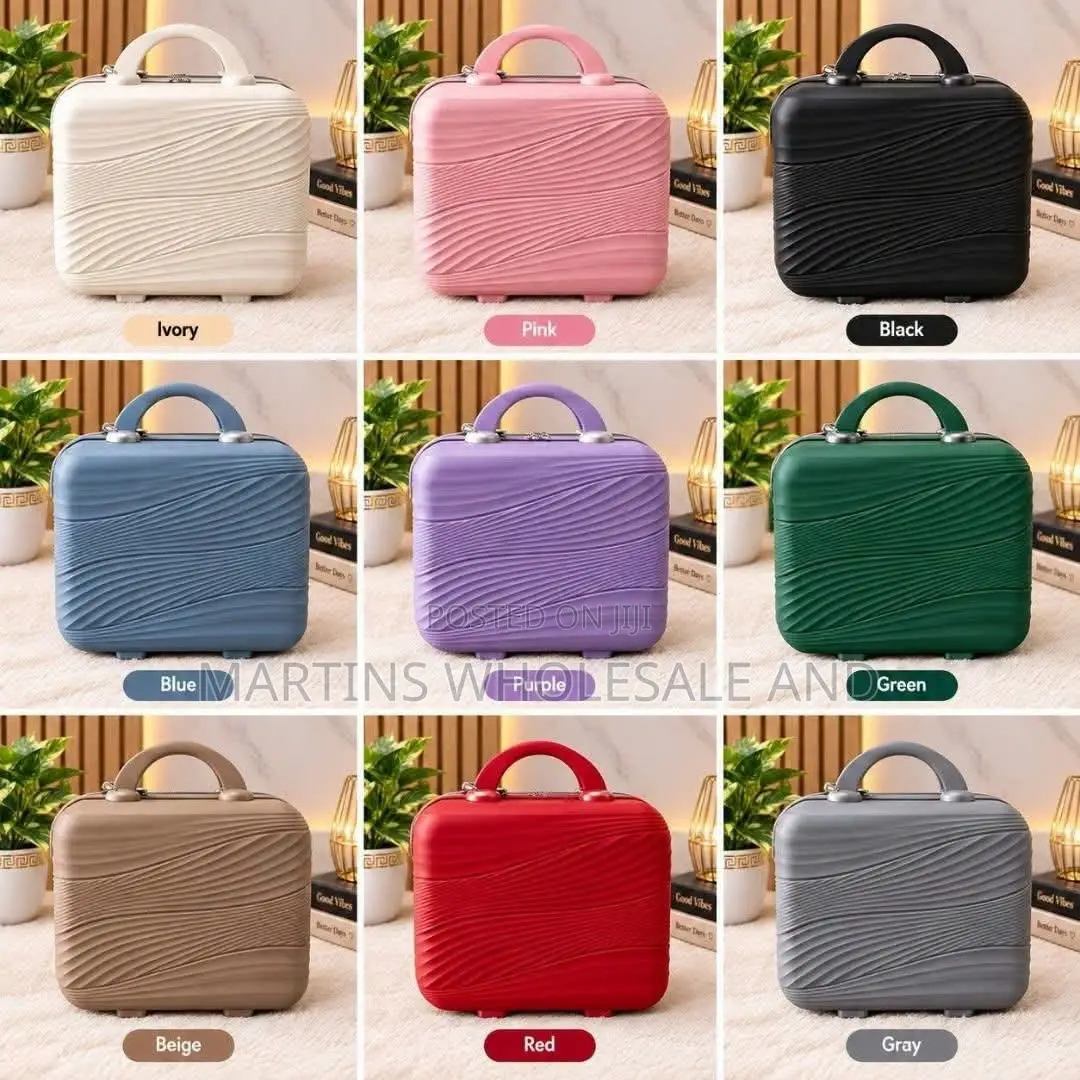 A Mini Hard-Shell Cosmetic, Vanity, or Children's Travel Case Featurin