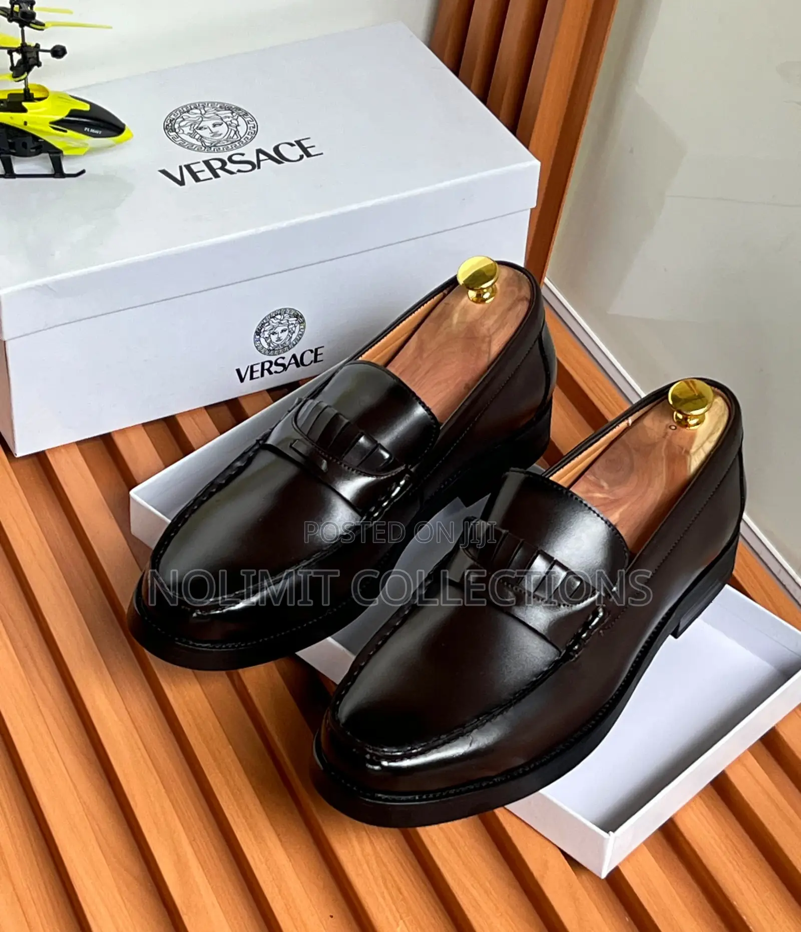 Men's Versace Leather Penny Loafers With Black Sole