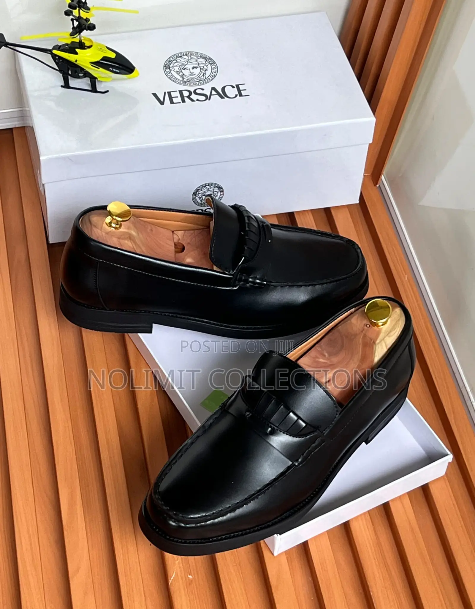 Men's Versace Leather Penny Loafers With Black Sole