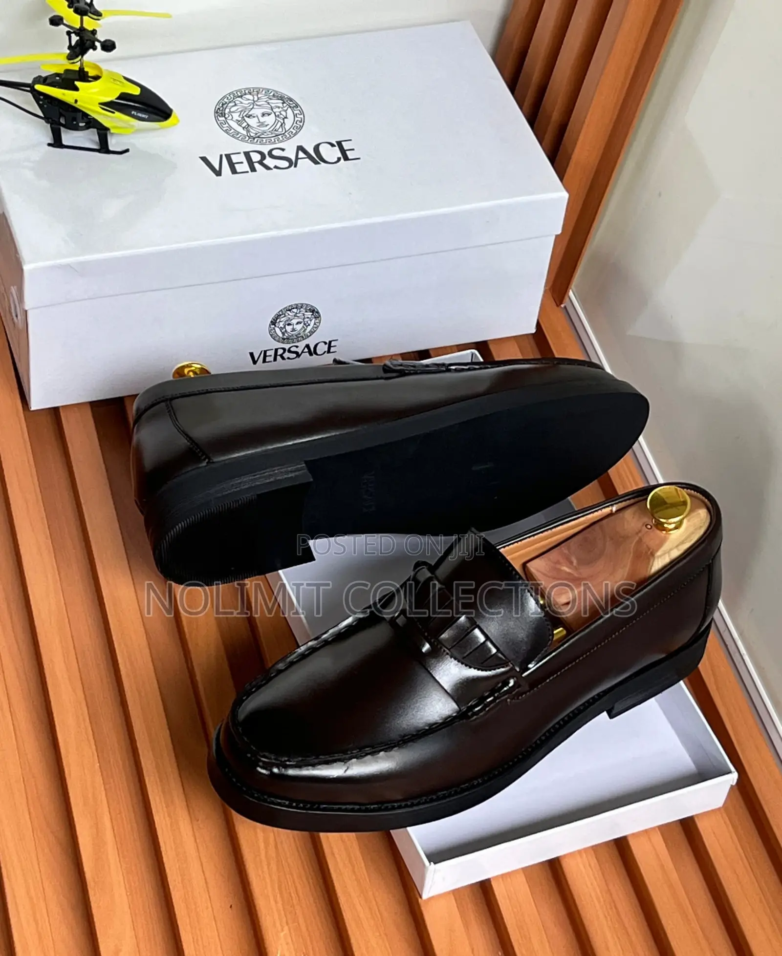 Men's Versace Leather Penny Loafers With Black Sole