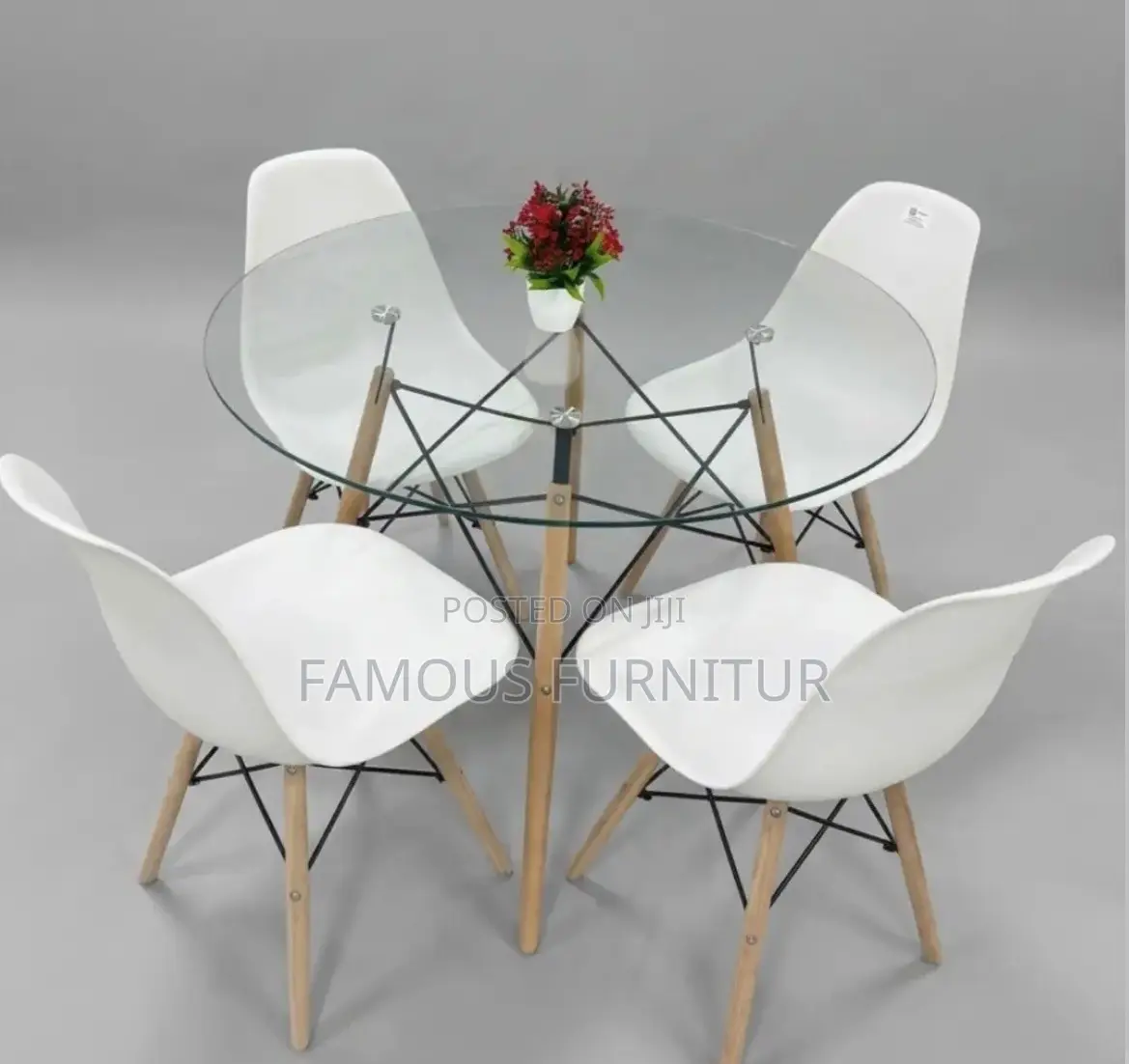 Round Glass-Top Dining Set With Four Eames-Style