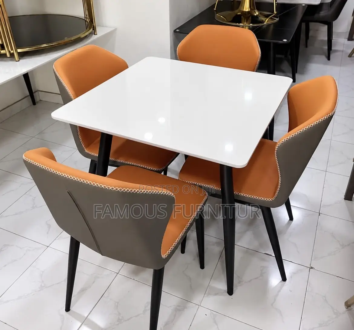 Square White Top Dining Table With Black Metal Legs.