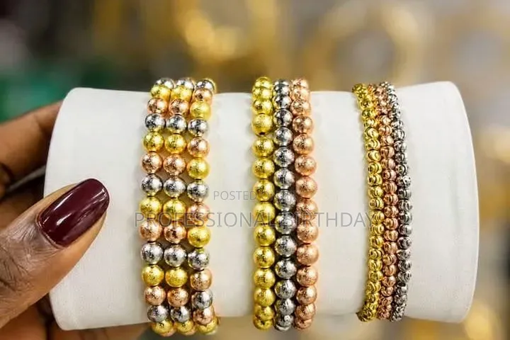 Chain, Bracket and Earring Set. Lagos