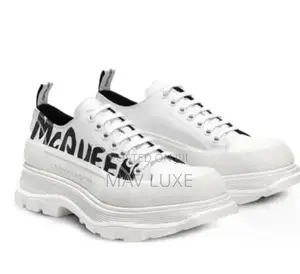 Alexander McQueen Tread Slick Low-Top Sneakers in the White and Black