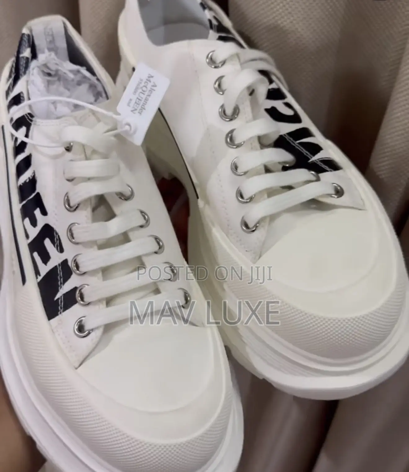 Alexander McQueen Tread Slick Low-Top Sneakers in the White and Black