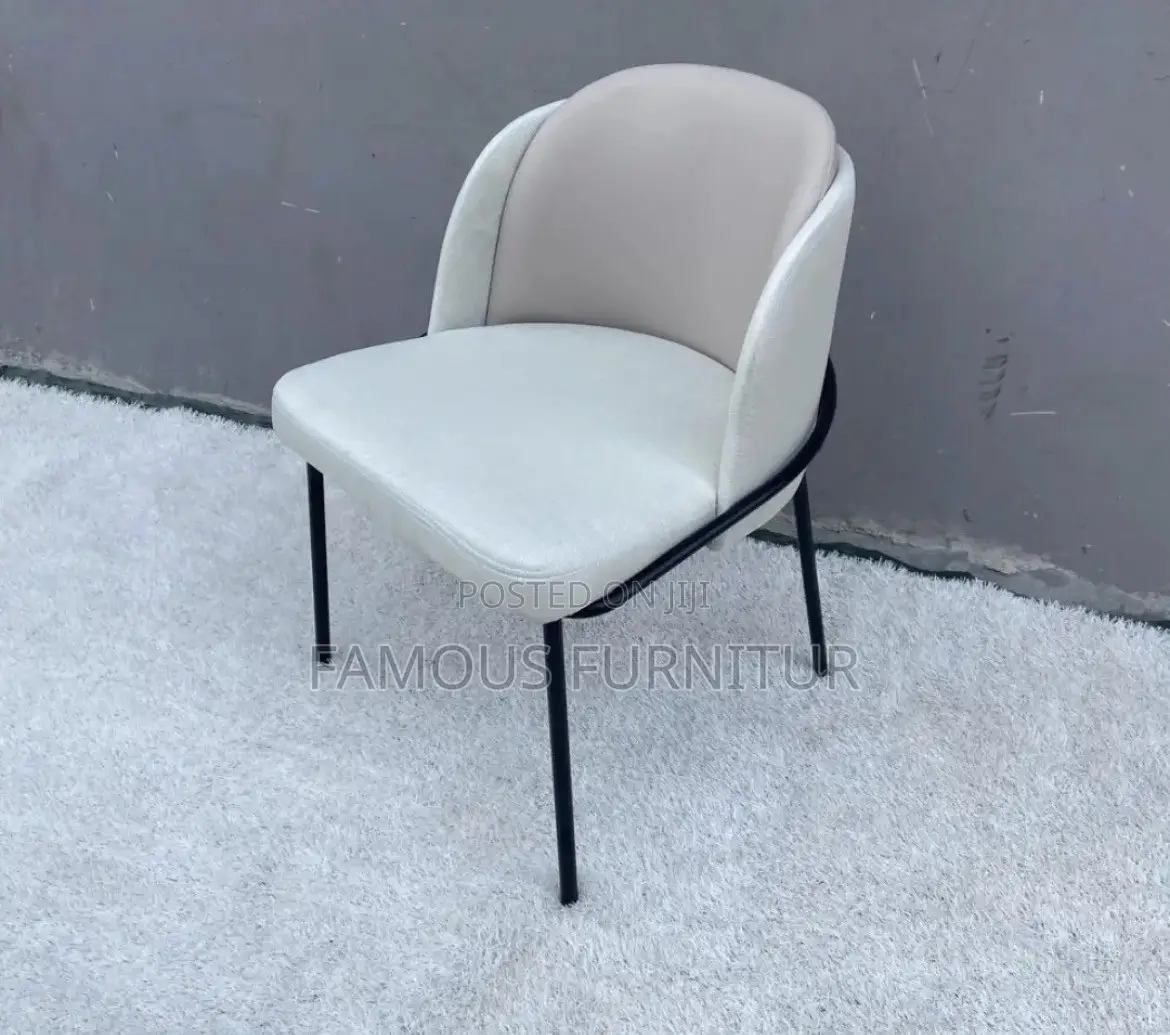 Modern Upholstered Dining Chair With a Curved Barrel Back, Contrasting