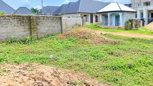 50ft × 100ft Plot of Land With Existing 4-Bedroom Bungalow Foundation