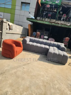 Neatly Padded L-Shaped Sofa Couch.