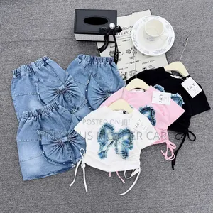 Girls Pink Top and Blue Jean 2 Pics