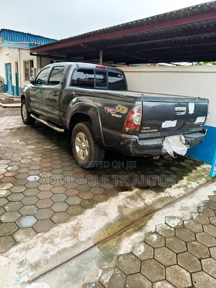 Toyota Tacoma V6 4dr Access Cab 4WD 6.1 ft. SB (4.0L 6cyl 5A) 2014 Gray