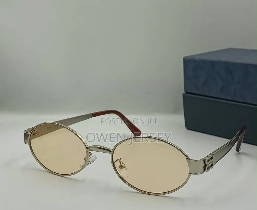 Gentle Monster Retro Oval Gold-Frame Sunglasses With Dark Lenses