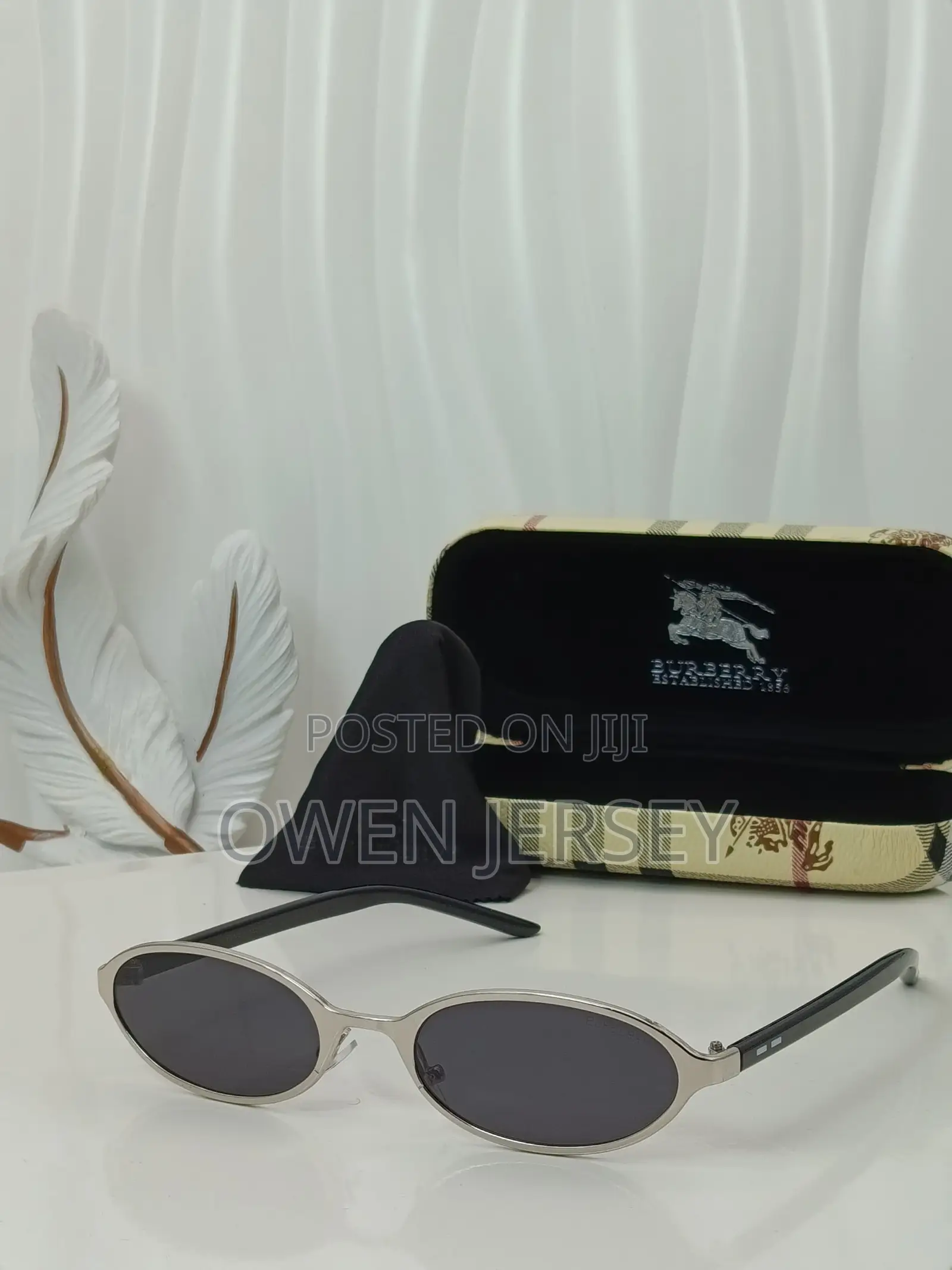 Burberry Vintage Oval Sunglasses With Silver Frame.
