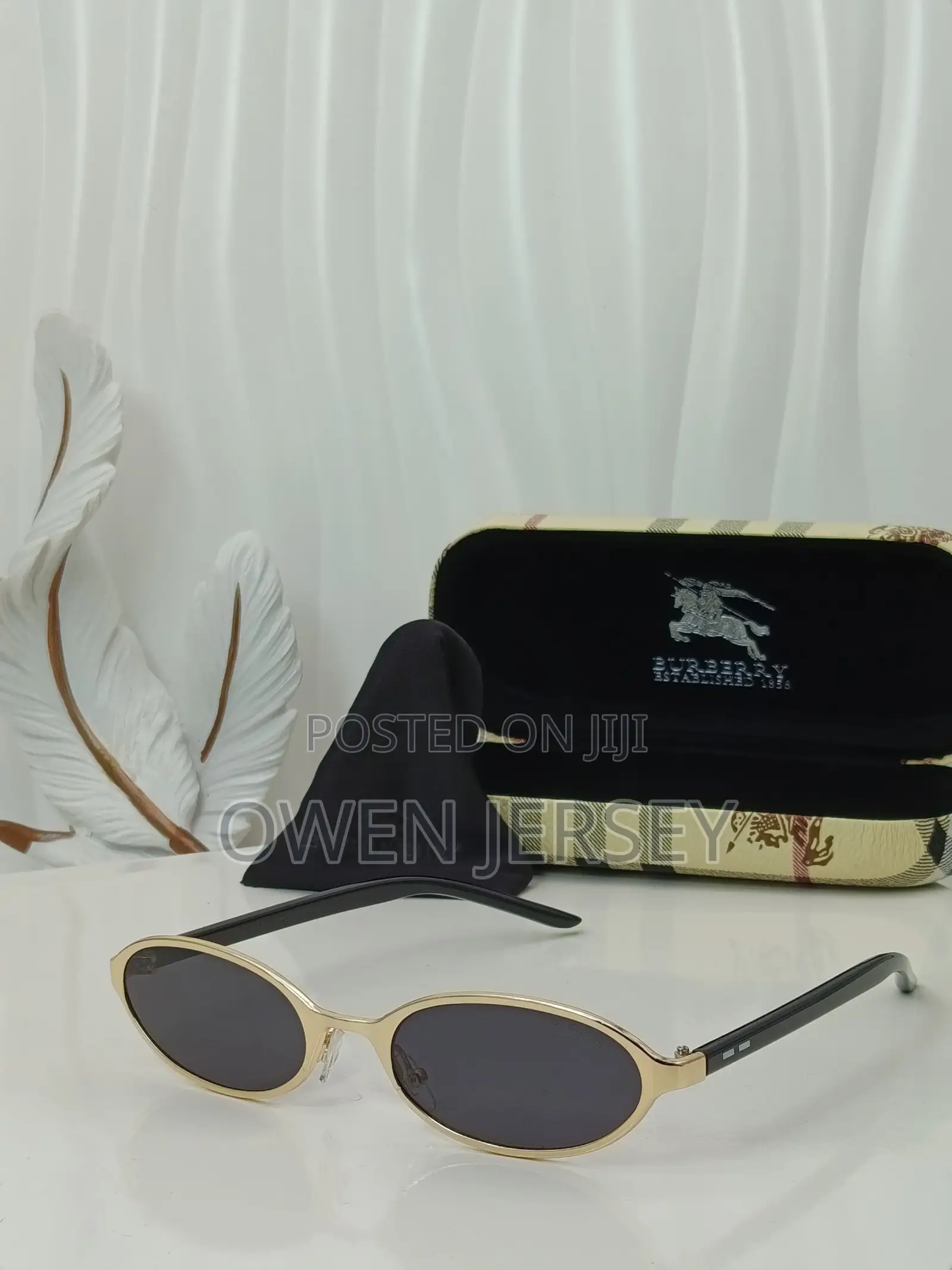 Burberry Vintage Oval Sunglasses With Silver Frame.