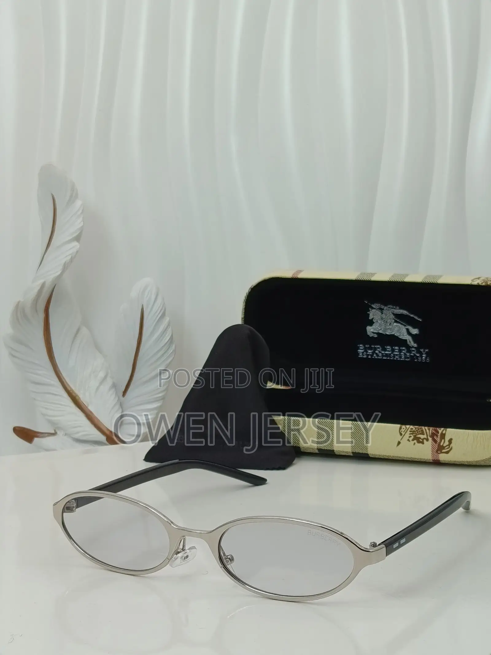 Burberry Vintage Oval Sunglasses With Silver Frame.