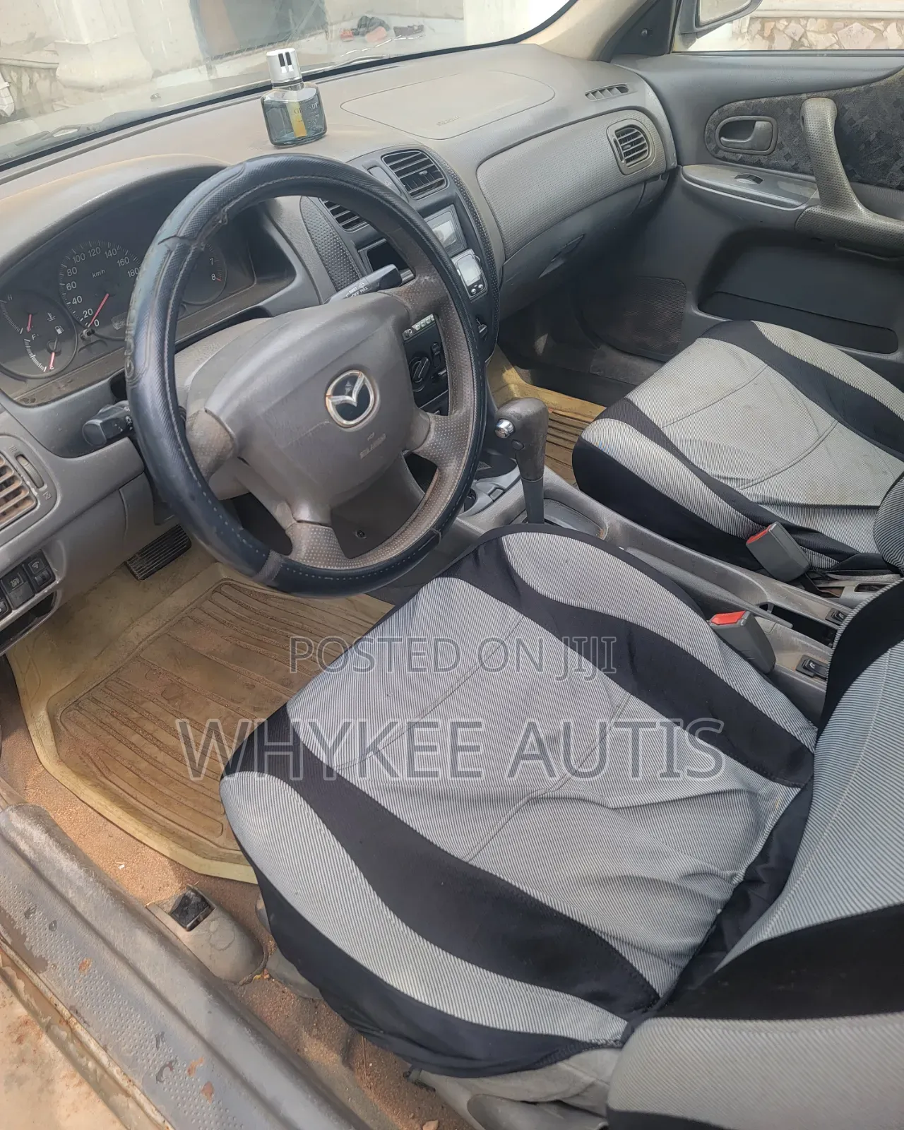 Mazda 323 2.0 2001 Gold