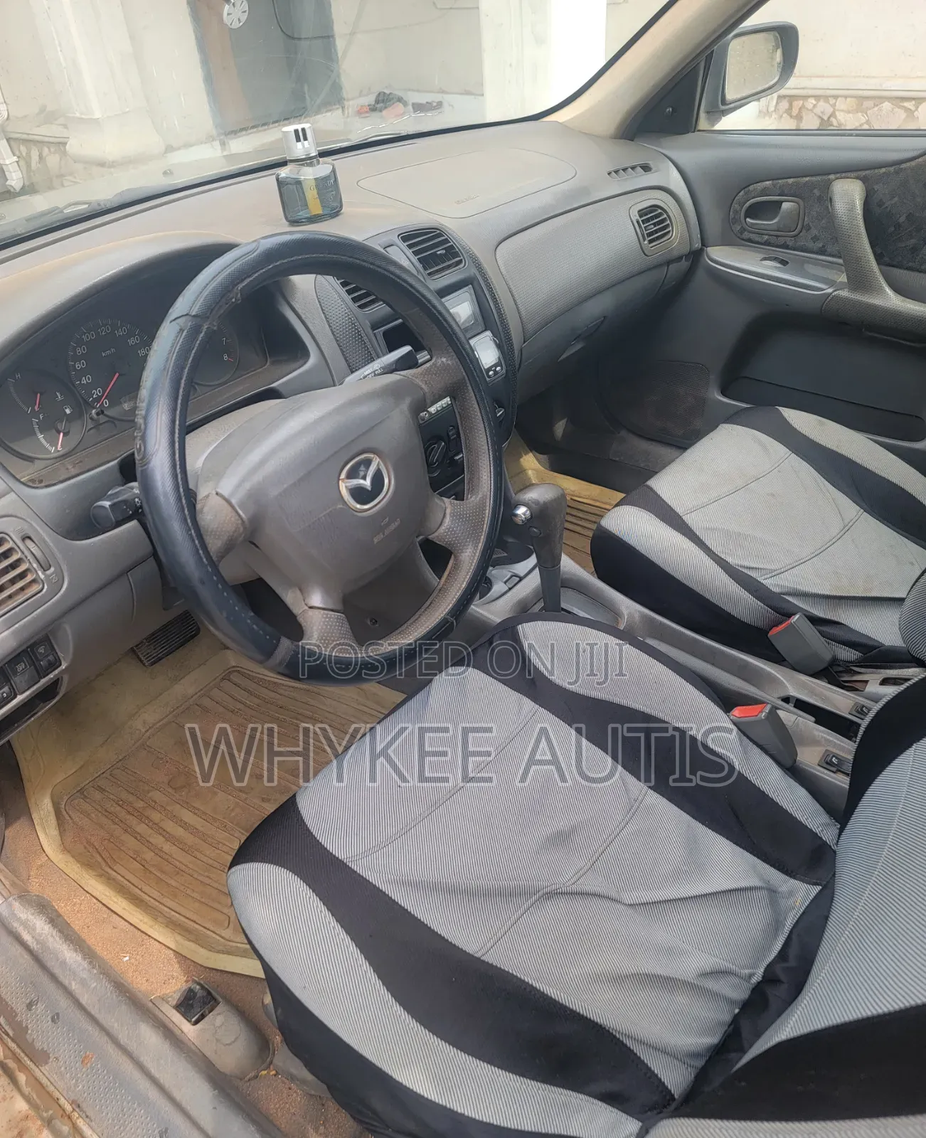 Mazda 323 2.0 2001 Gold