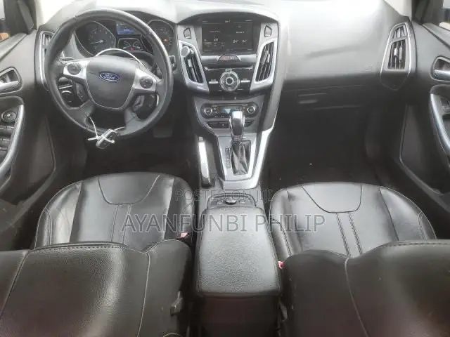 Ford Focus Titanium Sedan FWD (2.0 4cyl 5M) 2012 White