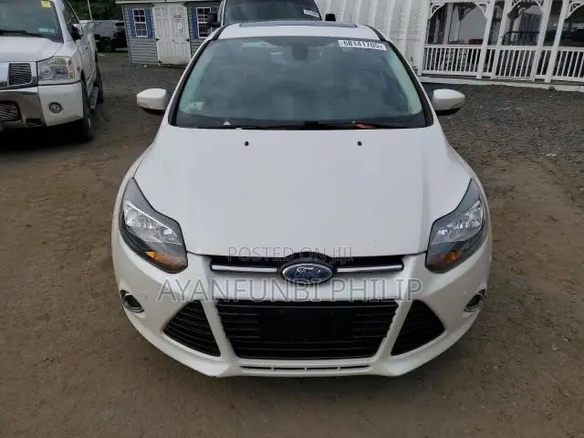 Ford Focus Titanium Sedan FWD (2.0 4cyl 5M) 2012 White