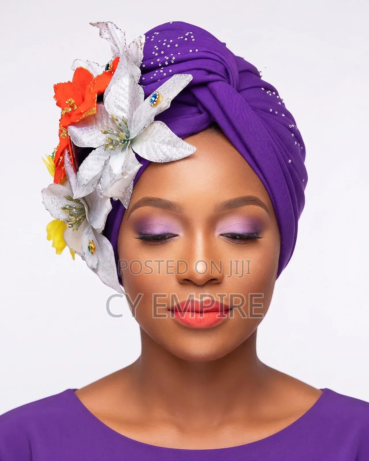 Purple Bejeweled Turban With Floral Accent