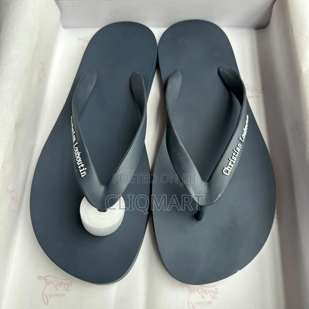 Christian Louboutin Minimalist Logo Flip-Flops | Luxury Resortwear