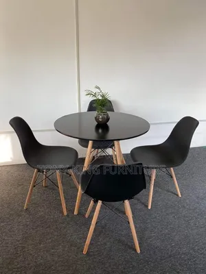 4-Seater Round Dining Set With a Wooden Black Tabletop