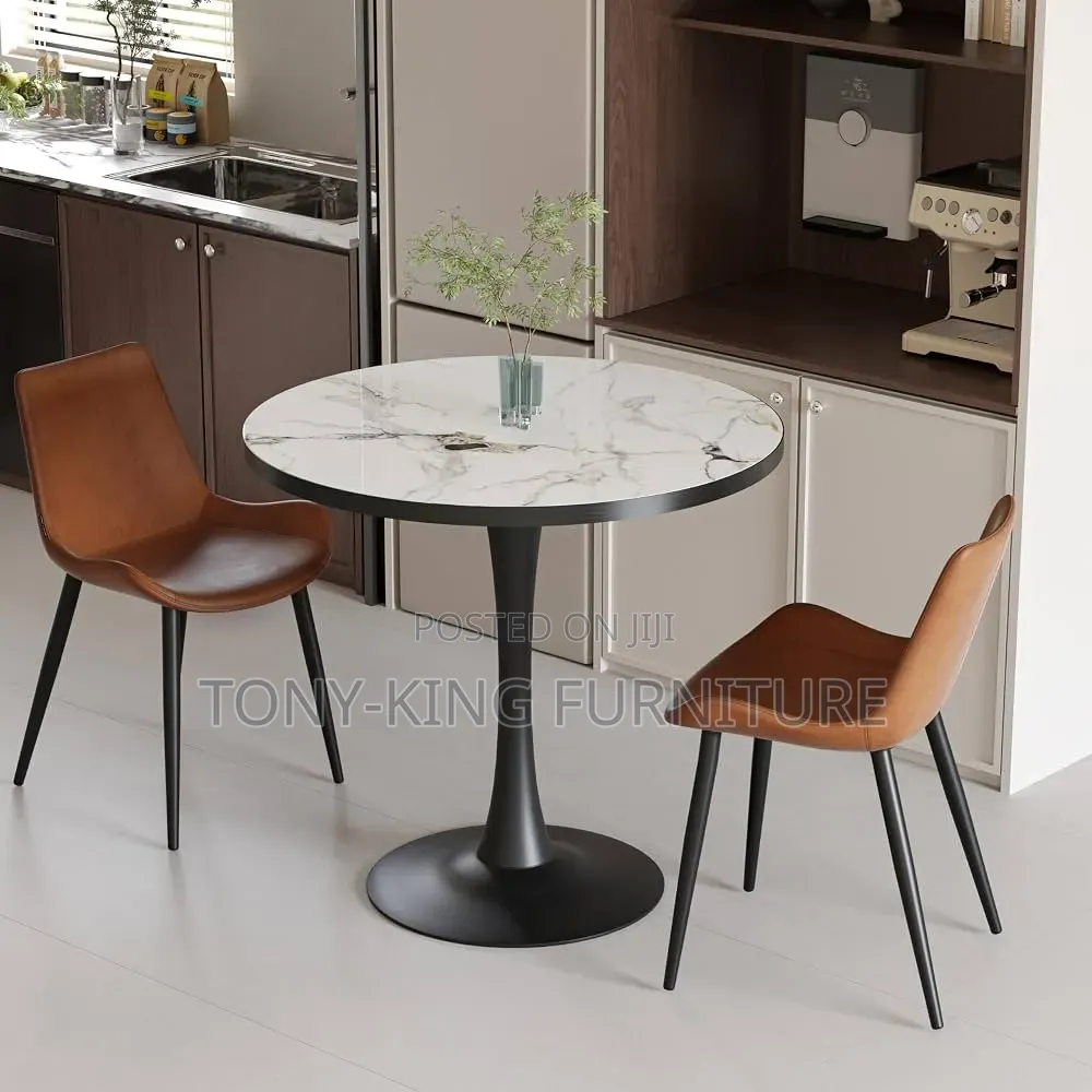 Round Kitchen and Dining Table Featuring a White Sintered Marble Top